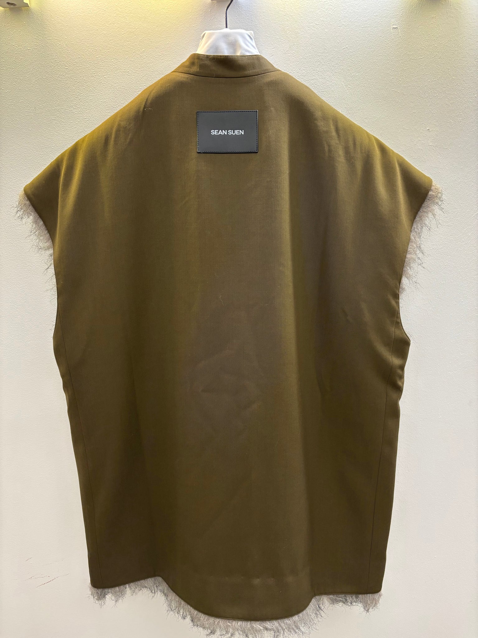 Green reversible faux-fur vest